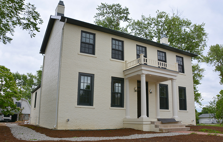 The Grant-Sawyer Home, a federal style house made of brick and hipped roof and located in Grove City, Ohio.