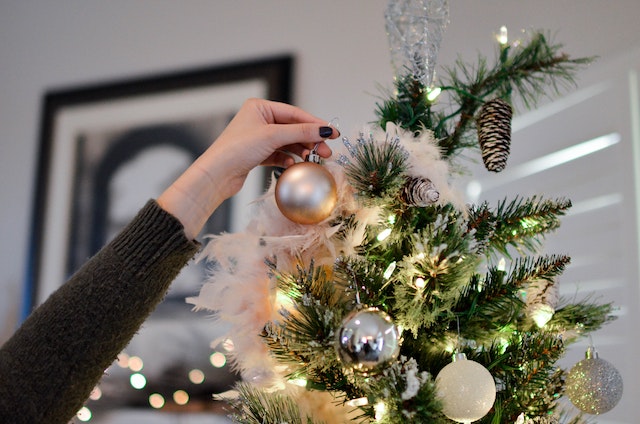 Holiday decor with ornaments and Christmas lights on a tree